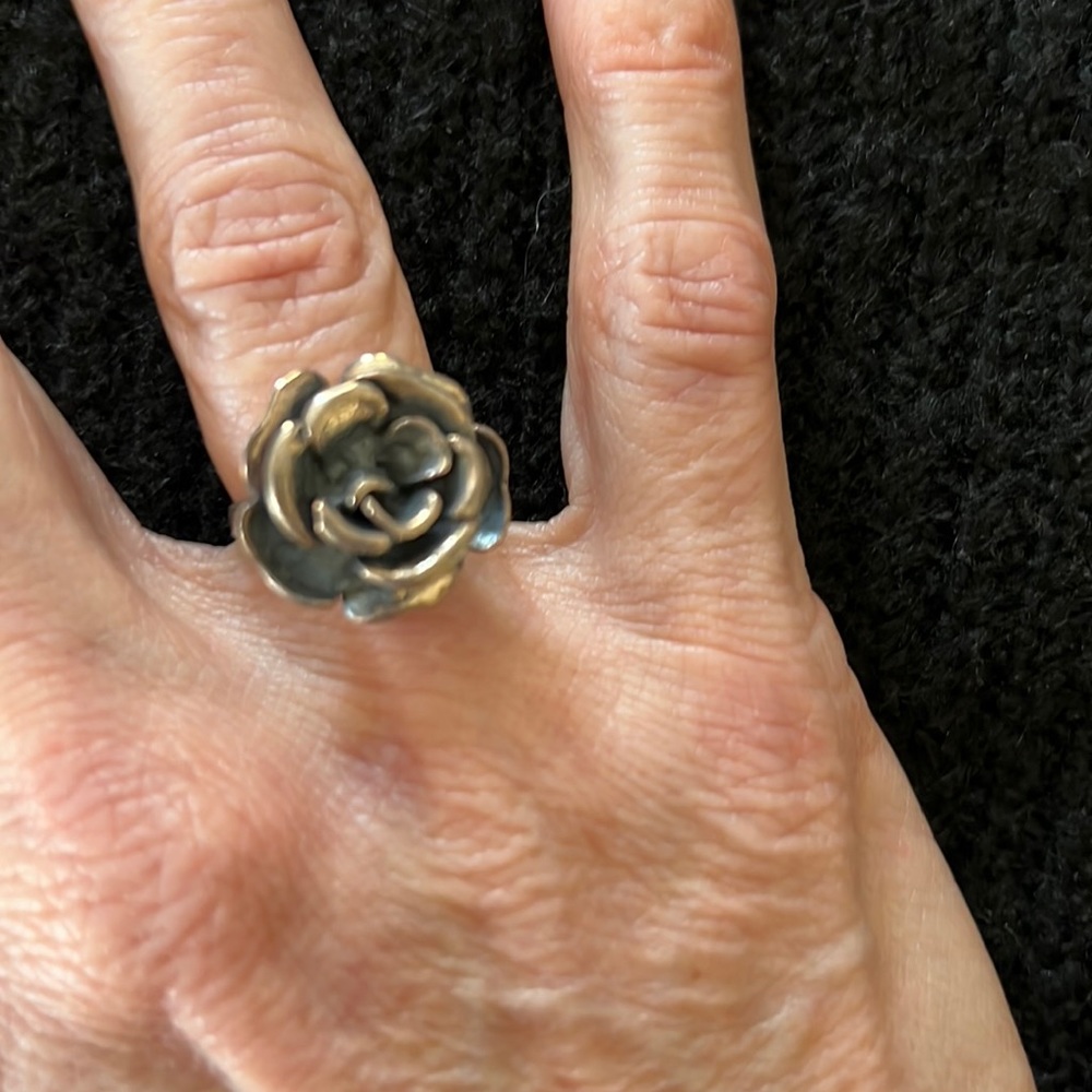 Silver rose ring.